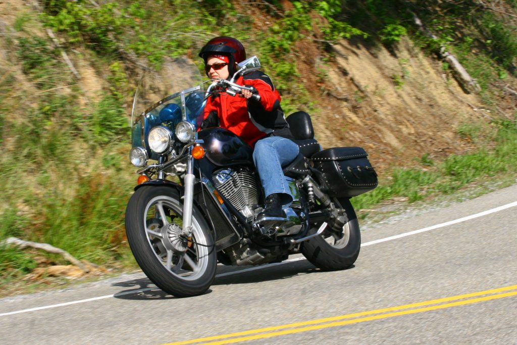 Profile of a Female Motorcyclist Meet Shirley - riding her motorcycle
