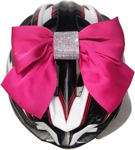 Large bow accessory for a female motorcyclist's helmet @helmetorheels